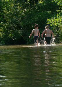 photo credit: two boys playing in river via photopin (license)