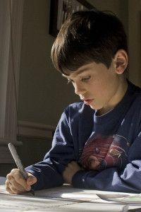photo credit: boy, with homework via photopin (license)